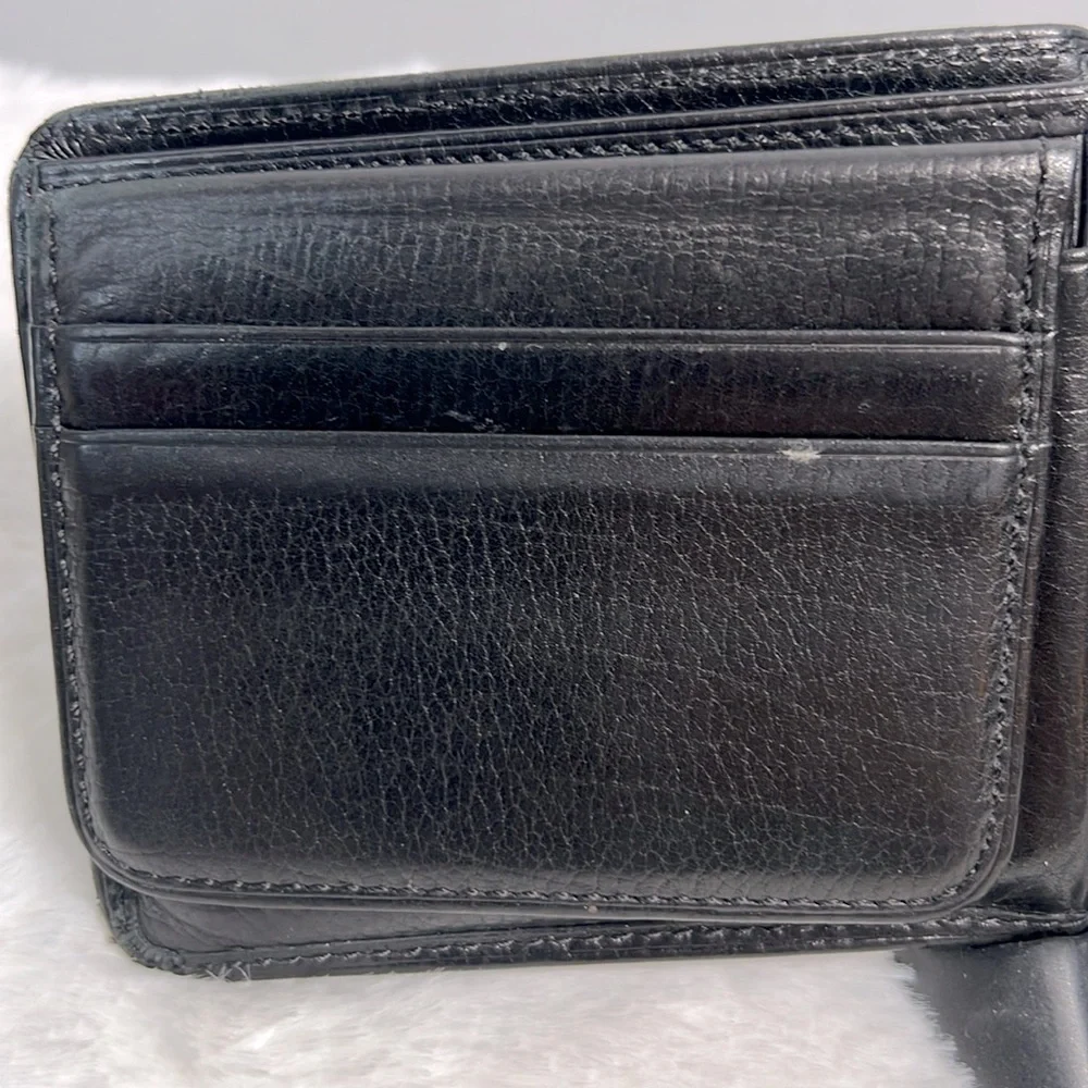 Tumi black leather